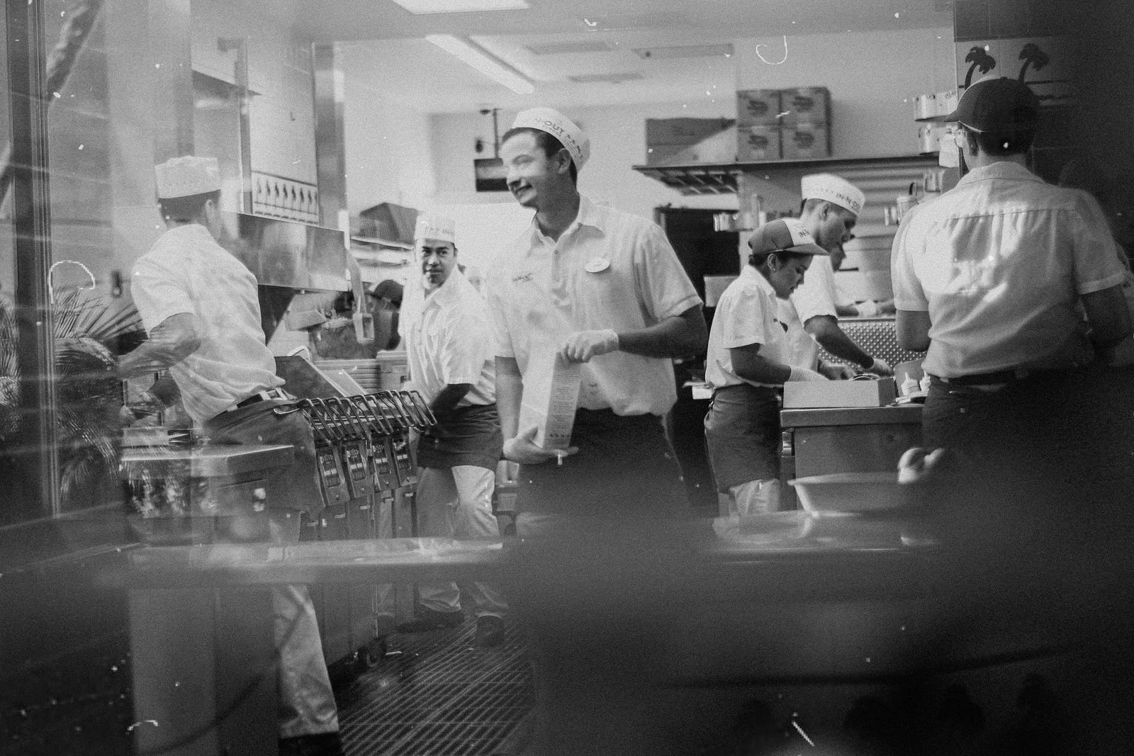 Black & White picture of a busy kitchen